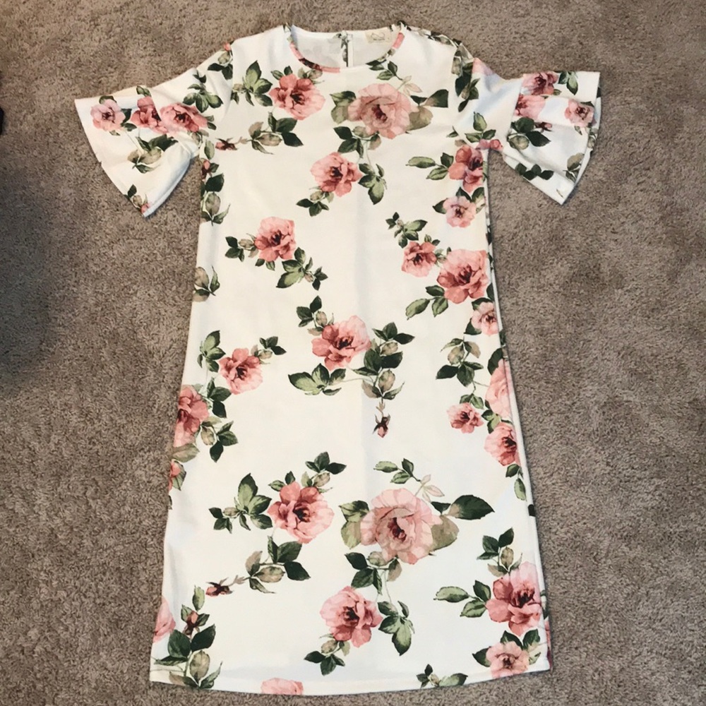 Super cute dress from a boutique. NEVER WORN!